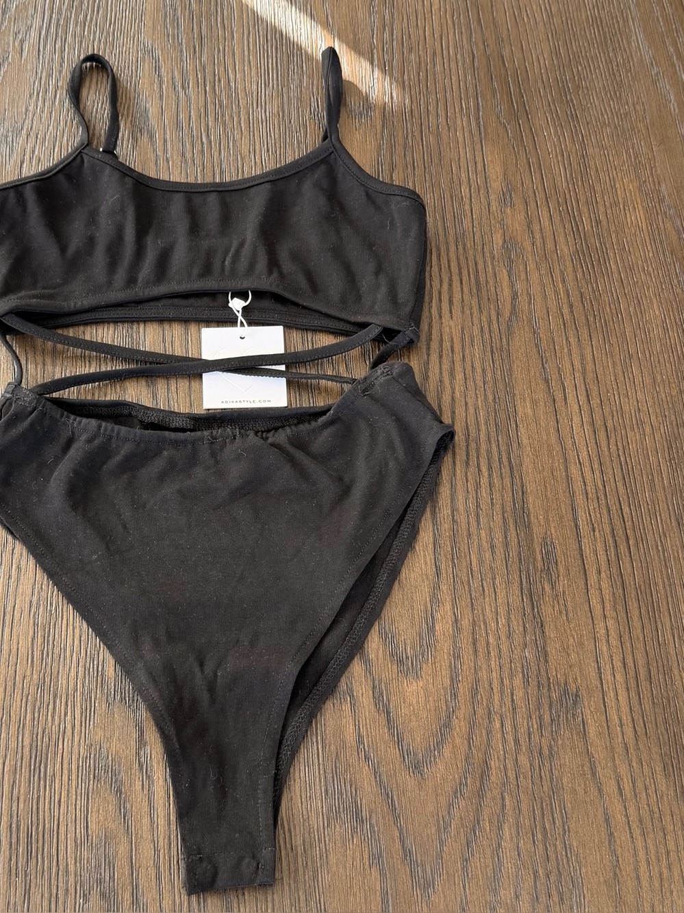 ⭐️NWT Adika Cut out black bodysuit